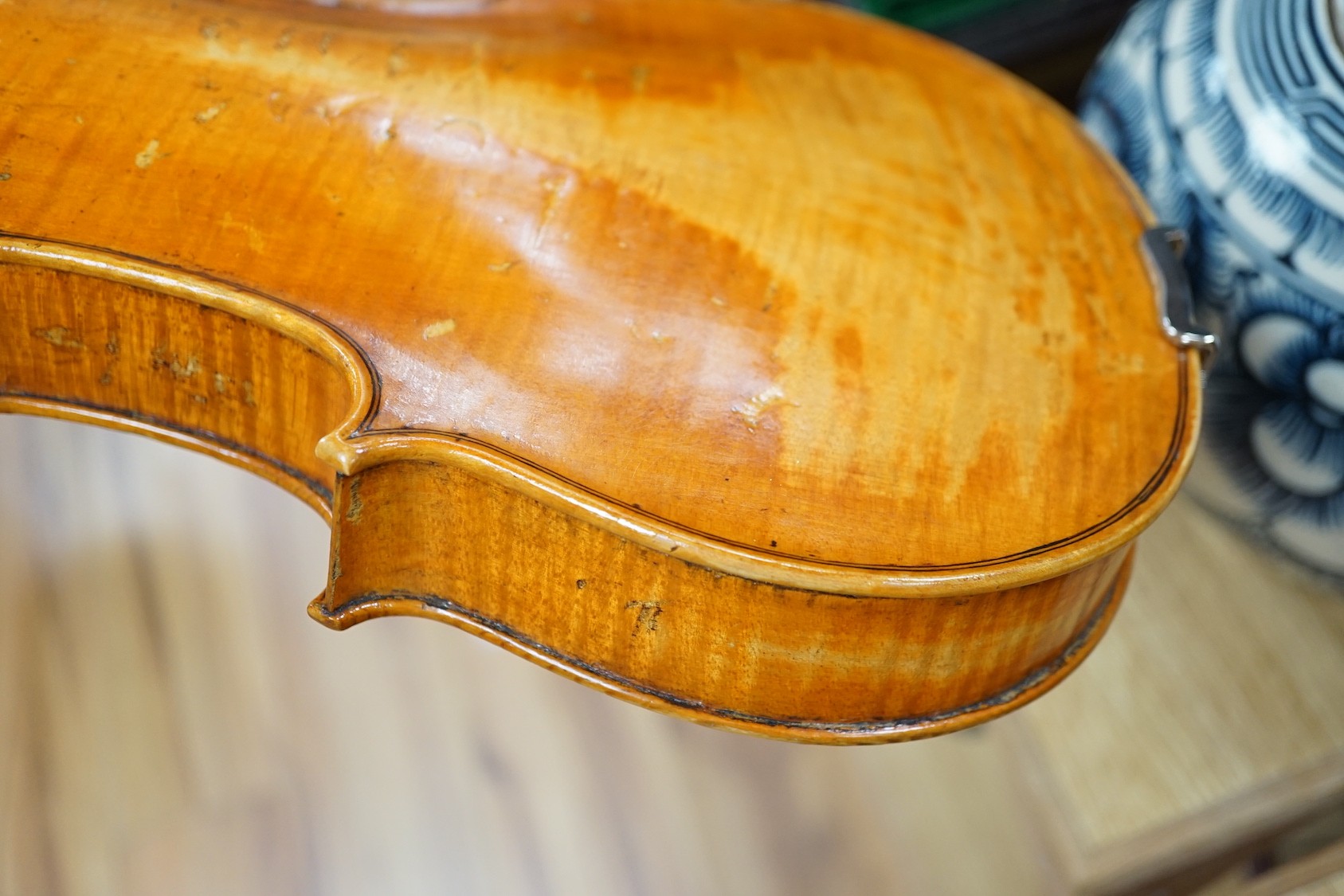 A cased violin, sound post loose